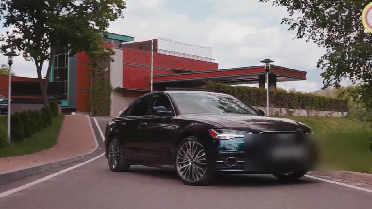 Modern car workshop with vehicle on a lift